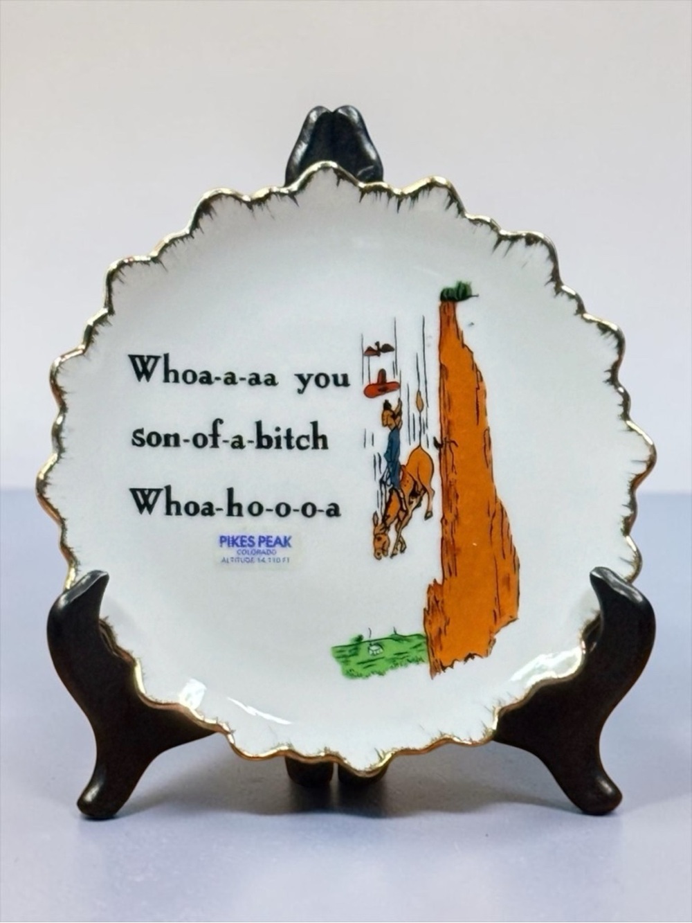 Decorative Plate Featuring a Humorous Illustration with Horse and Cowboy